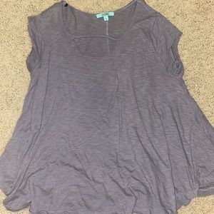 Gray karlie shirt with whole on neck and sleeves